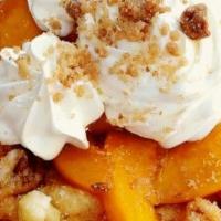 Oh So Peachy! · Funnel cake topped with peaches, cinnamon
