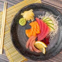 Sashimi · Chef’s choice of sliced raw fish with steamed rice - 12 pcs