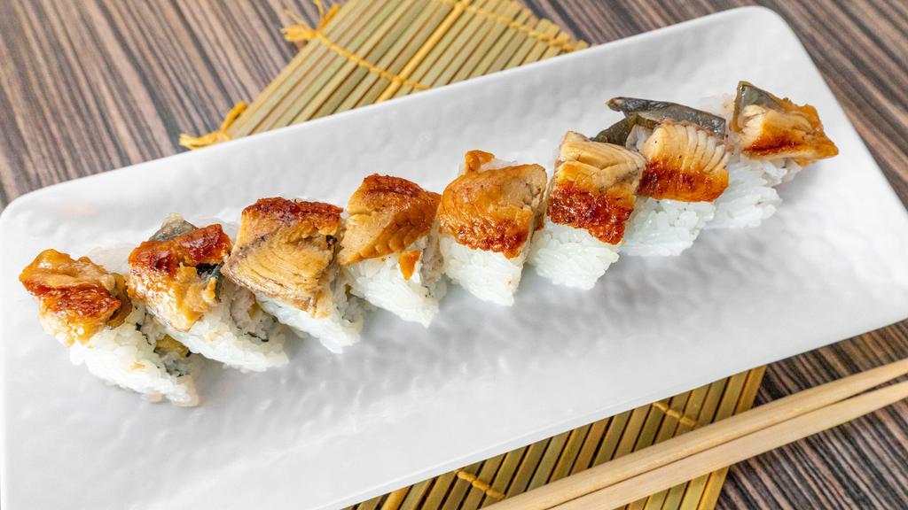 Dragon · Tempura shrimp, crabmeat | eel | masago |  special sauce