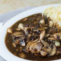 Chicken Marsala · Chicken sautéed in marsala sauce with mushrooms and roasted garlic with linguine.