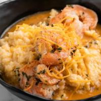 Shrimp N' Gritz · Our signature whipped Parmesan and Cheddar Gritz (served in a bowl or fried) topped with shr...