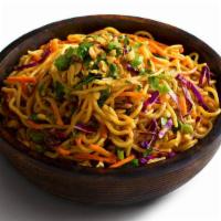 Spicy Thai Pasta Salad · Pasta, green onions, red cabbage, and peanuts
