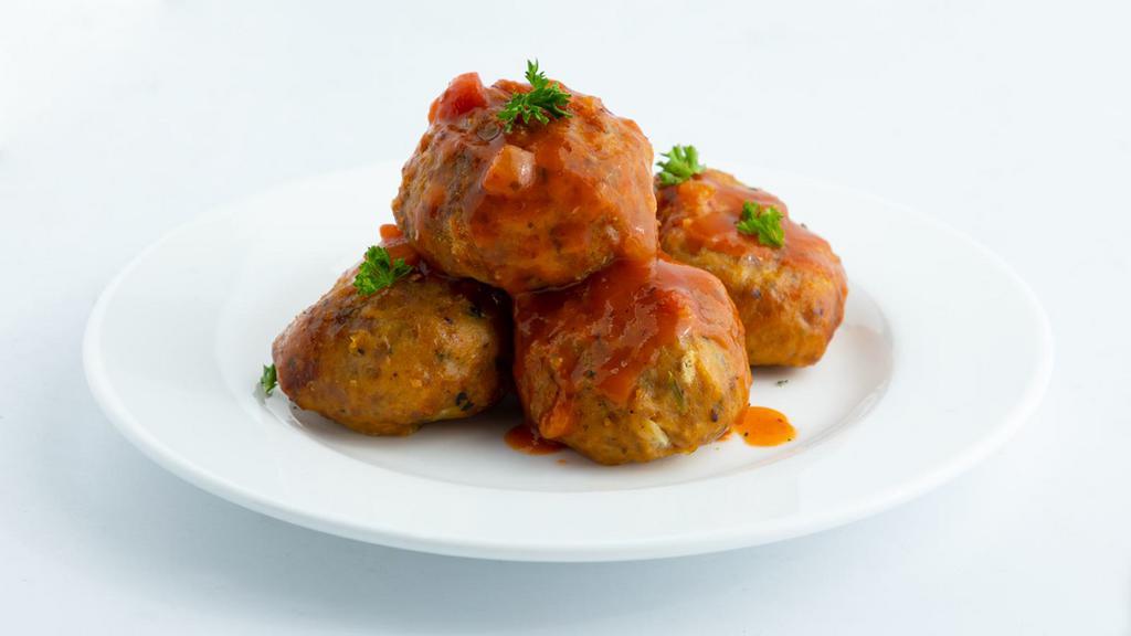 Turkey Meatballs · Turkey meatballs, tomato sauce, parmesan, and parsley