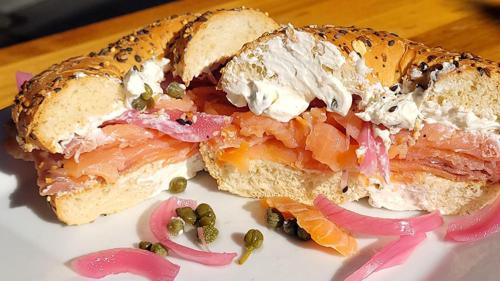 Smoked Salmon Sandwich · Smoked Salmon, Cream Cheese, Capers. and House Pickled Onions. Topped off with Everything but Bagel Seasoning. Choice of either croissant or everything bagel