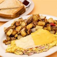 Ham Omelette · Ham, eggs, and melted shredded cheese. Comes with choice of a breakfast side and a bread side.