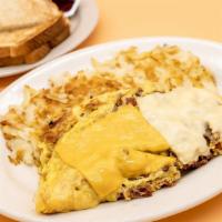 Pastrami Omelette · Juicy pastrami, eggs, and melted shredded cheese. Comes with choice of a breakfast side and ...