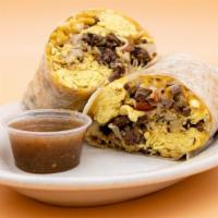 Carne Asada Breakfast Burrito · Carne asada, eggs, fresh hashbrowns, and melted shredded cheese in a flour tortilla.