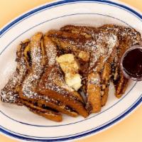 Side Of French Toast · 6 slices of our popular French toast topped with powdered sugar and cinnamon.