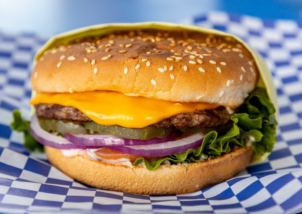Cheeseburger · Bun, hamburger patty, melted American cheese, onions, lettuce, tomato, pickles, and our signature 1000 Island dressing.