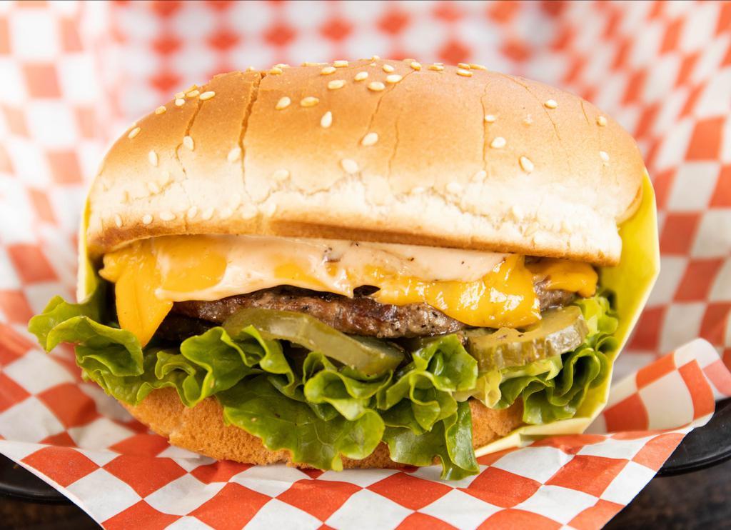 Double Cheeseburger · Bun, 2 hamburger patties, 2 slices of melted American cheese, onions, lettuce, tomato, pickles, and our signature 1000 Island dressing.