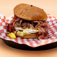 Pastrami Burger · Bun, hamburger patty, juicy pastrami, onions, lettuce, tomato, pickles, and our signature 10...