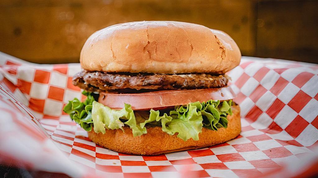 Junior Burger · Junior bun, junior hamburger patty, lettuce, tomato, pickles, and our signature 1000 Island dressing.