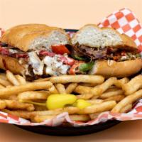 Philly Cheesesteak Sandwich · Juicy ribeye steak, caramelized onions, and melted Swiss cheese on a French roll.