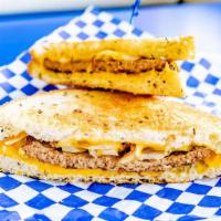 Patty Melt · A hamburger patty, melted cheese, and grilled onions on the toast of your choice.