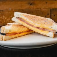 Grilled Ham & Cheese Sandwich · Ham and melted cheese on the toast of your choice.