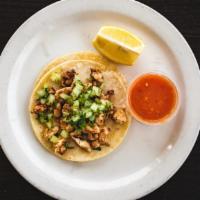 1 Taco · 1 taco in a corn tortilla. Comes with choice of meat, and fresh onions and cilantro.