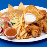Fried Chicken Dinner · 4 pieces of fried chicken, onion rings, a dinner roll, choice of a soup or salad, and choice...
