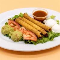 Side Of 3 Taquitos · A side order of 3 taquitos, with fresh guacamole and sour cream. (Choice of chicken or beef).