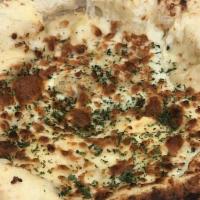 Garlic Cheese Bread · Garlic cream sauce, mozzarella, parmesan, parsley
