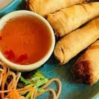 Shrimp Rolls · Deep-fried shrimp, mixed with Thai spices, wrapped with egg roll skins, served with sweet an...