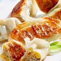 Potstickers · Deep fried potstickers served with house sweet & sour sauce