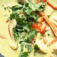 Green Curry (W/ Rice) · Green curry with coconut milk, bamboo shoot, . bell pepper, eggplant, green beans & basil.