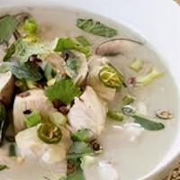 Tom Kha (W/ Rice) · Coconut milk with white onion and mushroom