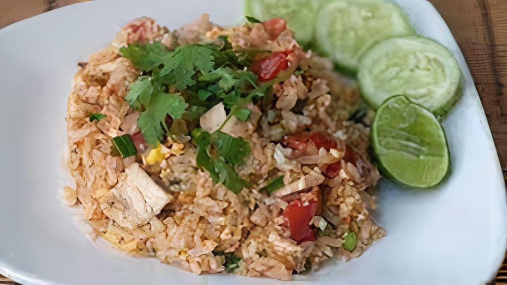 Fried Rice · Choice of meat; Sautéed with rice, eggs, tomatoes, and sweet onion