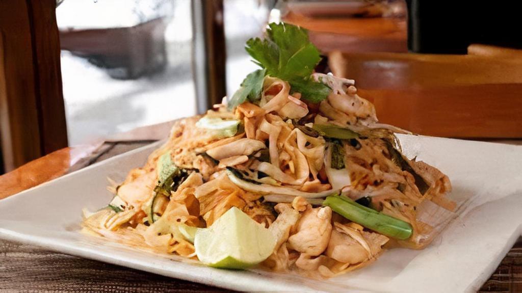 Pad Thai · Choice of meat; stir-fried noodles with eggs, tofu, bean sprouts, topped with crushed roasted peanuts
