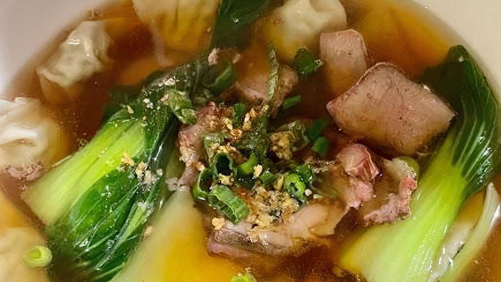 Chicken Wonton · Egg noodles served with wontons and bok choy