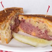 Reuben Sandwich · Corned Beef, Swiss Cheese, Sauerkraut, Thousand Island Dressing, on Grilled Rye