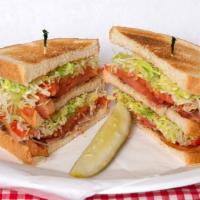 Blt On Toast Double Deck Sandwich · Tomatoes, Lettuce, Black Pepper and Mayo. Add cheese for an additional charge.