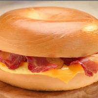 Breakfast Bagel Sandwich · Plain bagel with egg, cheese, ham, or bacon with house-made secret sauce.