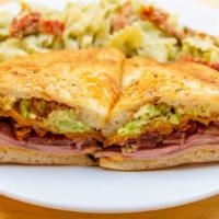 Santa Fe Hot Ham Sandwich · Black forest ham, Cheddar cheese, chipotle mayonnaise, smoked bacon, onion crisps, avocados,...