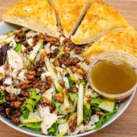Walnut And Green Apple Salad · Mixed greens, grilled chicken, Bleu cheese crumbles, green apples, candied walnuts, champagn...