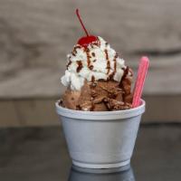 Sundae · Two scoops of ice cream, whipped cream, nut topping and cherry