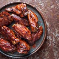 Hot & Spicy Chicken Wings · Bone-in wings tossed in our classic hot & spicy sauce. 1/4 lb. price (1/2 lb. and 1 lb. opti...