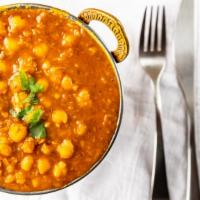 Channa Masala · Chickpeas cooked with onions, tomatoes, and spices.