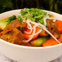 Phở Bò Kho (Beef Stew Noodles) · The hearty, fragrant aroma of bò kho (beef stew) fills the air as you pass by. The aromatic ...