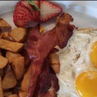 Jardin Breakfast · Two eggs, with your choice of crispy bacon, breakfast sausage or ham.