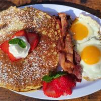 Pancake Combo · 3 fluffy buttermilk pancakes, with choice of 2 bacon strips, 2 pork sausage or 2 black fores...