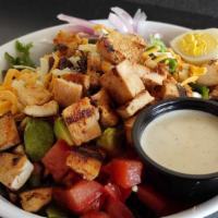 Cobb Salad · Mixed greens, grilled chicken, tomatoes, red onions, hard-boiled eggs, avocado, jack & chedd...