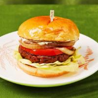 Vegan Burger · Vegan patty with tomato, lettuce, onions, and vegan house sauce.