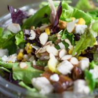 Sawtelle · Spring mix, romaine, roasted turkey, dates, roasted corn, goat cheese, sliced almonds, and c...