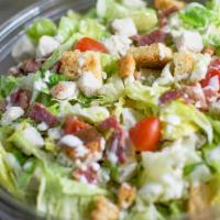 Darren Bell · Romaine, spinach, roasted turkey, tomato, smoked bacon, croutons, Swiss and Bleu cheese. Che...