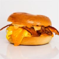 Bagel, Bacon, Egg, & Cheddar · 2 scrambled eggs, melted Cheddar cheese, smoked bacon, and Sriracha aioli on a toasted bagel.