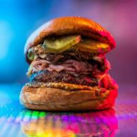 Havana - The Cubano Burger · 6oz signature burger patty, roasted pork, ham, pickles, brown mustard, gruyere, brioche bun....