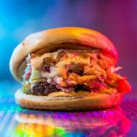The Blackstone Burger · 6oz signature burger patty, corned beef, smoked swiss, caramelized onions, sauerkraut, thous...