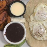 El Barón  · Dos huevos estrellados, platano frito,queso, aguacate y dos tortillas echas a mano.

Dos fri...