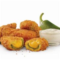 Ched ‘R’ Peppers · Comes with ranch dipping sauce. Spicy jalapeños filled with melty Cheddar cheese, breaded an...